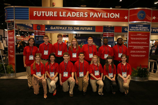 Group of people under Future Leaders Pavilion sign