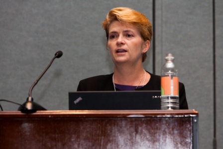 Woman speaking at podium